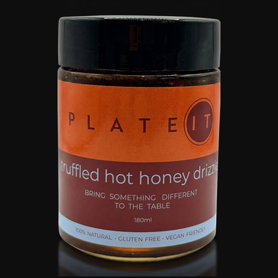 Plateit Truffled Hot Honey Drizzle jar on a black background