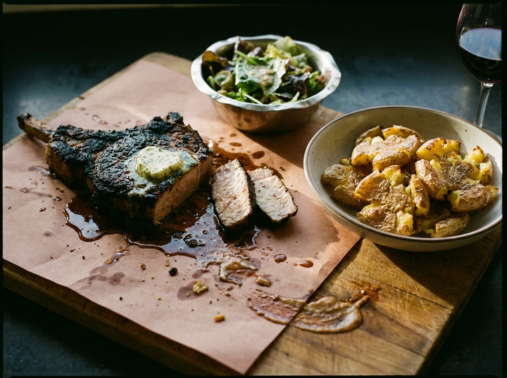Charcoal Pork Tomahawk with Voodoo Butter made with Plateit Voodoo Salt