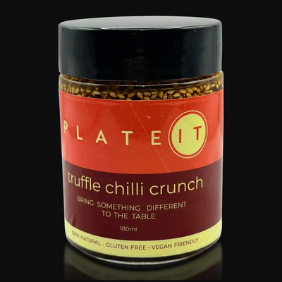 Plateit Truffle Chilli Crunch jar on a black background